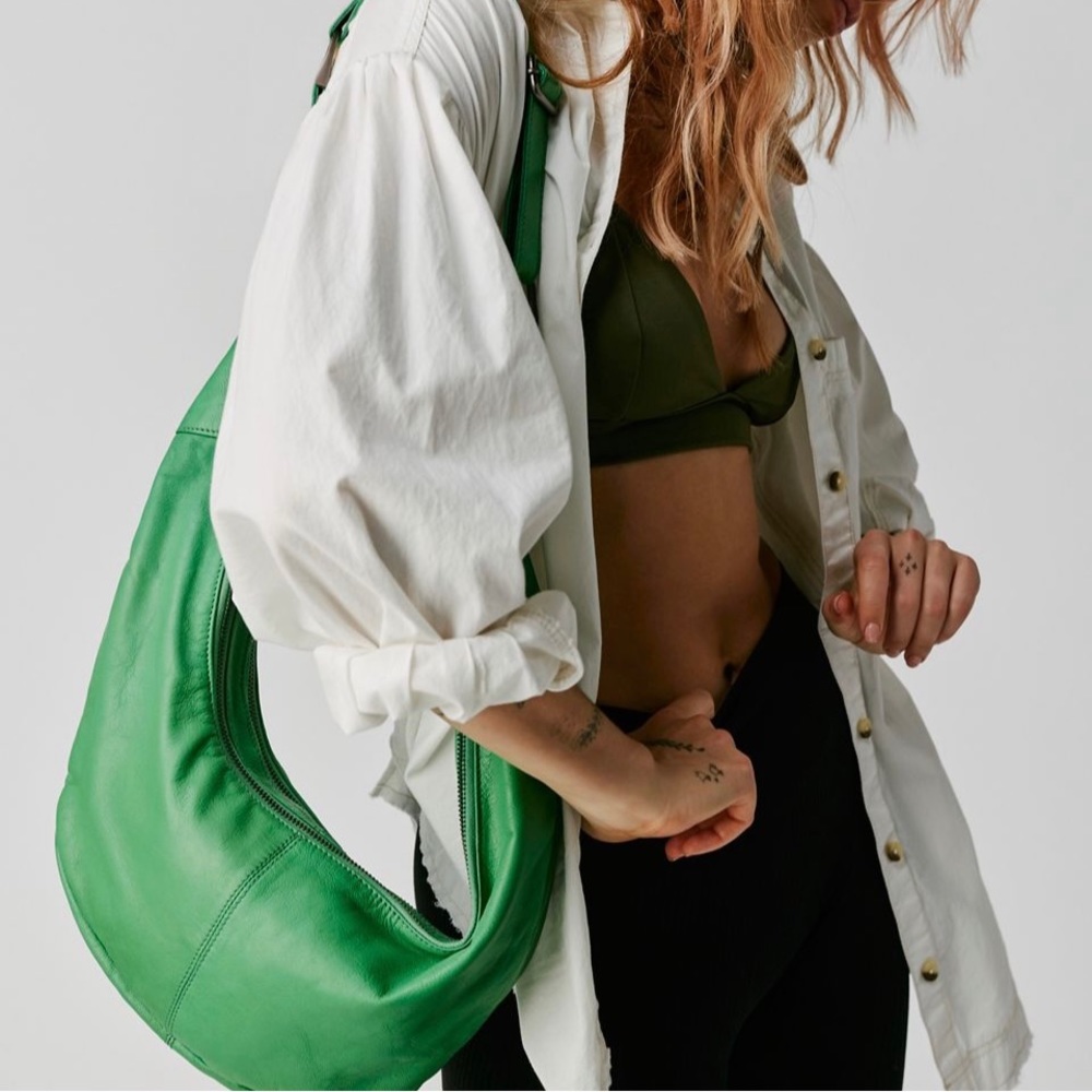 FREE PEOPLE soft, leather sling bag. Shoulder or cross-body. Green